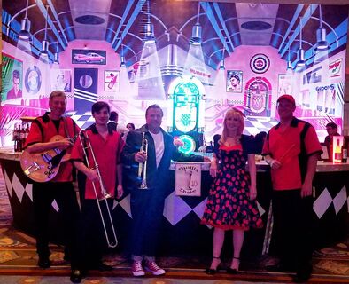 The Chrome 57 Band, an Oldies Band and 50s Band located in Tampa, FL performing at Recent Grease theme party.