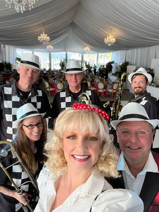 The Chrome 57 Band, an Oldies Band and 50s Band located in Sarasota, FL performing at Recent Grease theme party.