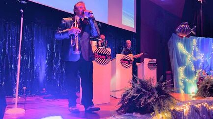 The Chrome 57 band is a 50s band and Oldies band performing in Amelia Island, Florida and is pictured here at recent 50s gala.